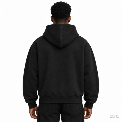 Male model wearing Cultured black heavyweight hoodie back view with CLTD watermark