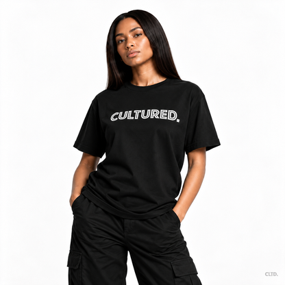 Female model wearing CULTURED. black T-shirt, front view, subtle CLTD. watermark
