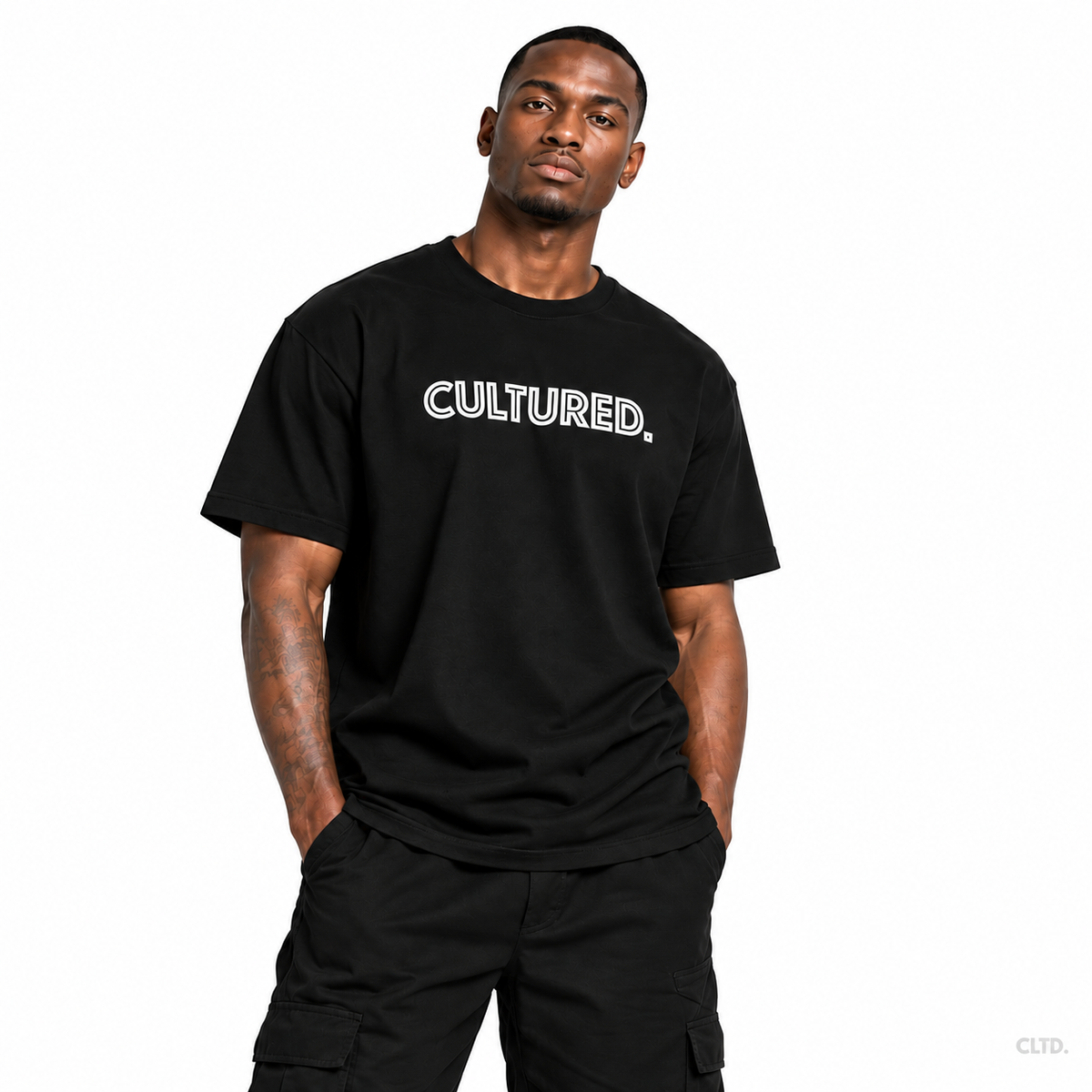 Male model wearing CULTURED. black T-shirt, front view, subtle CLTD. watermark