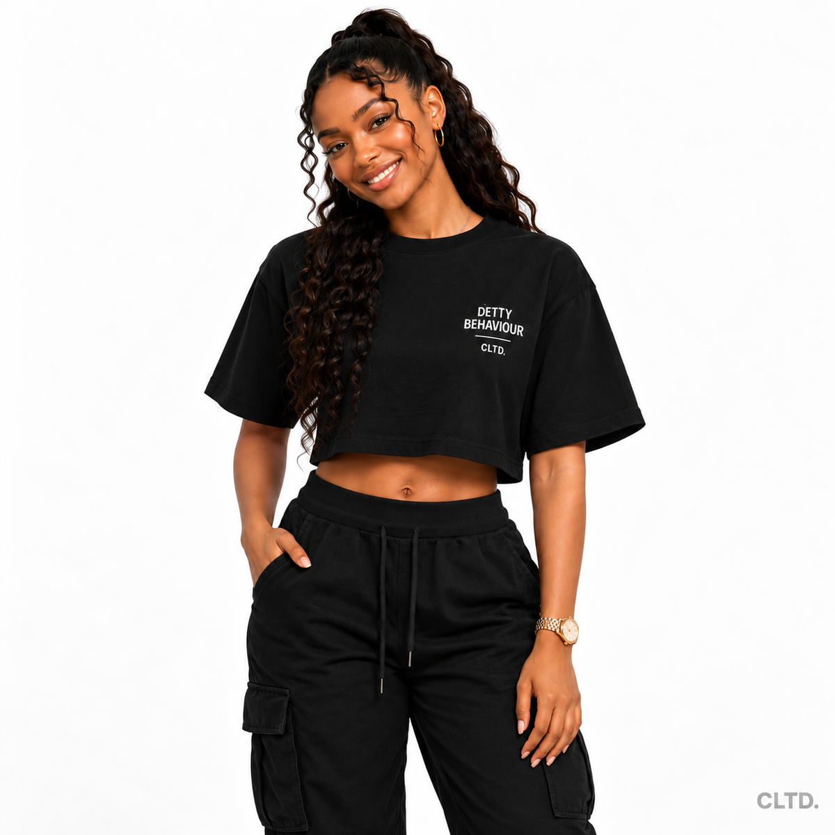 Detty Behaviour black crop top — female model front view