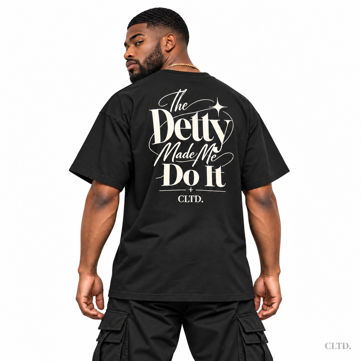 T-Shirt — The Detty Made Me Do It Style 2, male model back view showing cream artwork