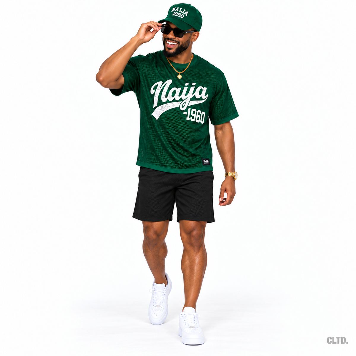 Male model wearing the green Naija 1960 mesh jersey, adjusting sunglasses
